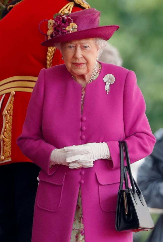 The Queen wears head-to-toe bright colours to stand out from the crowd