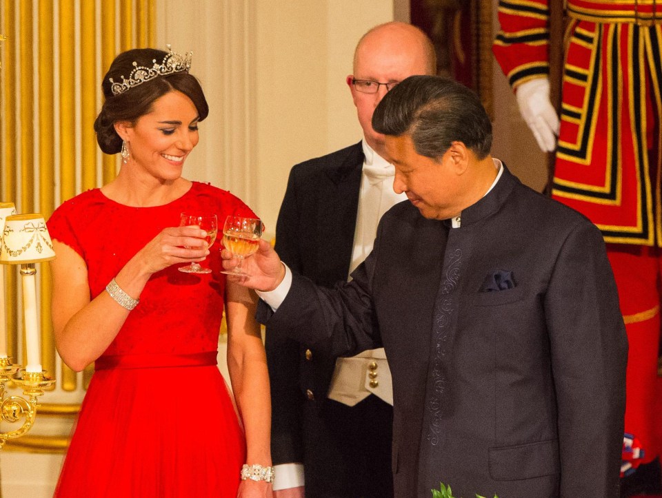 Kate, pictured at a state banquet, only began wearing tiaras after the Royal Wedding