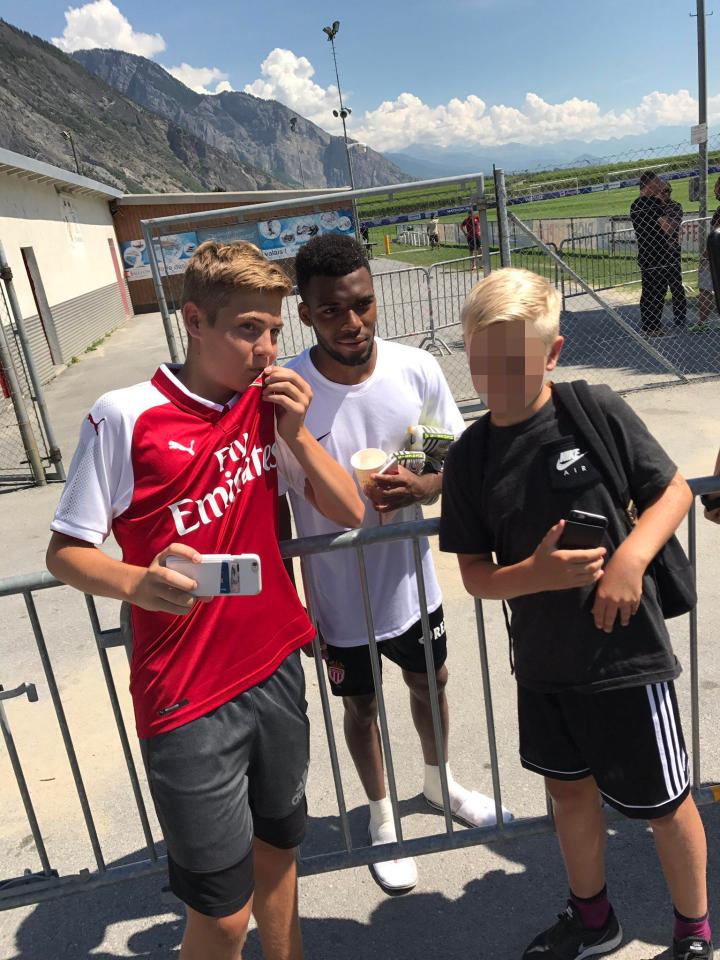  The Monaco star didn't mind having his picture taken alongside the jersey