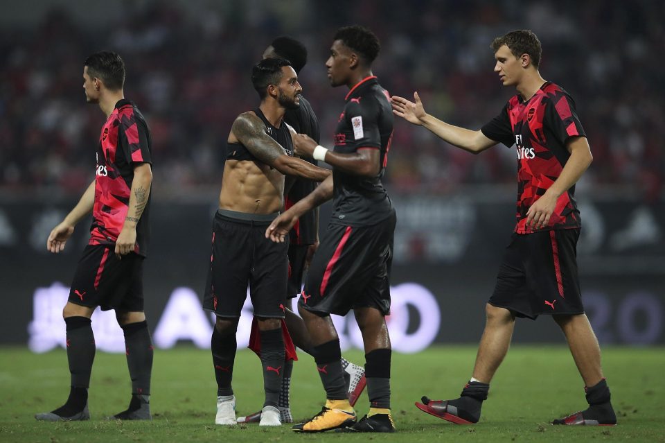  The Gunners stars celebrate after defeating Bayern Munich on penalties