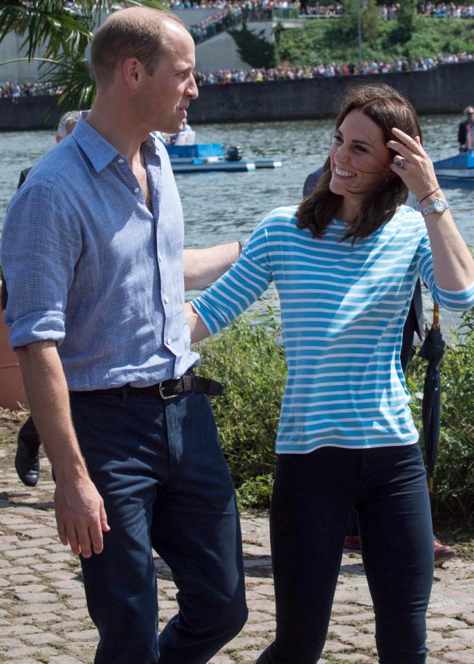  Kate swapped her stylish Jenny Packham dress, below, for a stripey top and sporty leggings while William removed his jacket and put on a pair of blue trainers