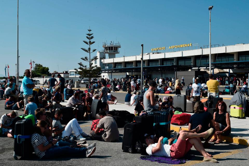  Many resorted to lying down on the tarmac outside the airport as they waited for a flight home