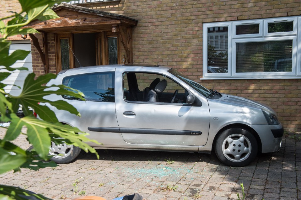 A Renault Clio with a smashed driver’s window was seen outside