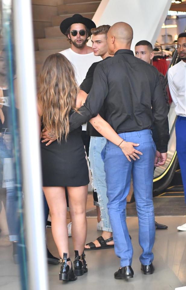 Chloe couldn't resist having a cheeky feel of Jeremy's bum as they walked through the shopping centre 