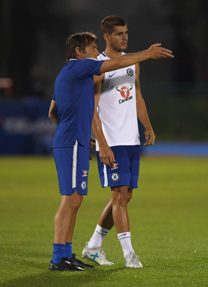 Antonio Conte has a tactical chat with new signing Alvaro Morata