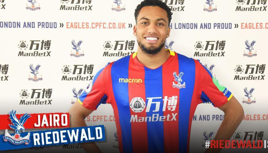  Jairo Riedewald posed in a Crystal Palace shirt following his move