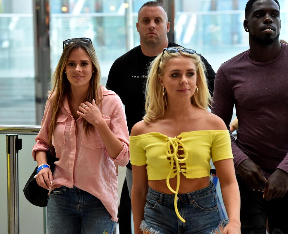  The girls looked fresh-faced as they prepared for the flight back to Britain