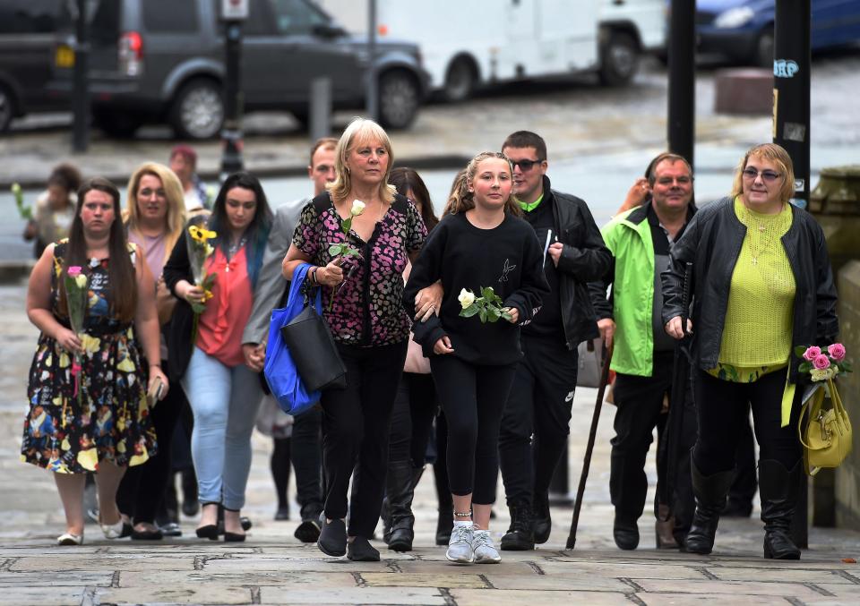  Mourners arriving ahead of the service