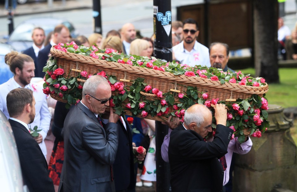 Saffie’s coffin was covered in roses as it was carried into the cathedral