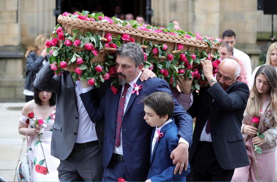 Saffie Roussos dad carried his daughters coffin from the church while embracing his son Xander