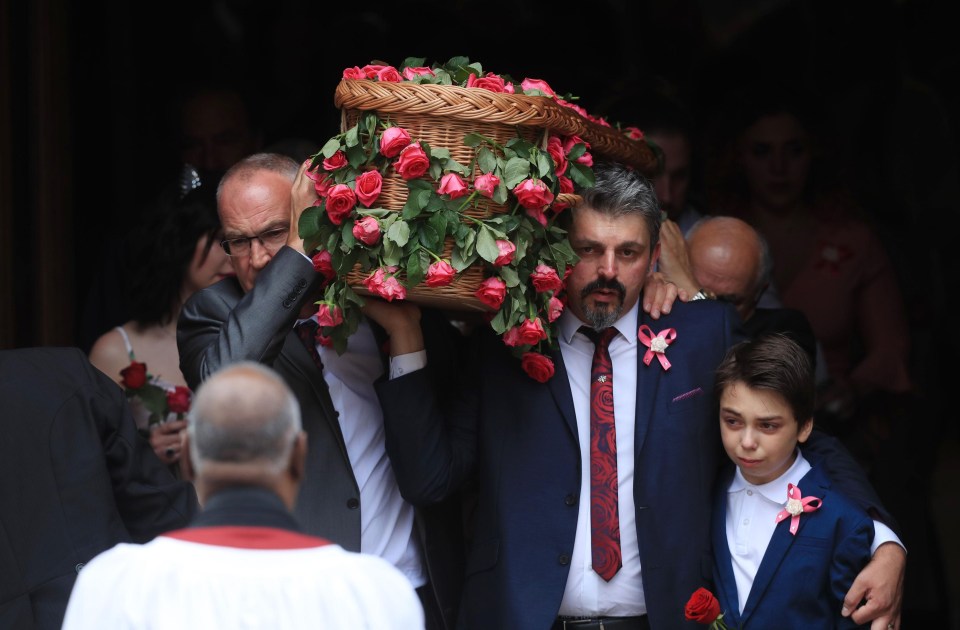 Laden with roses and held high Saffie was taken away from Manchester Cathedral for a private cremation