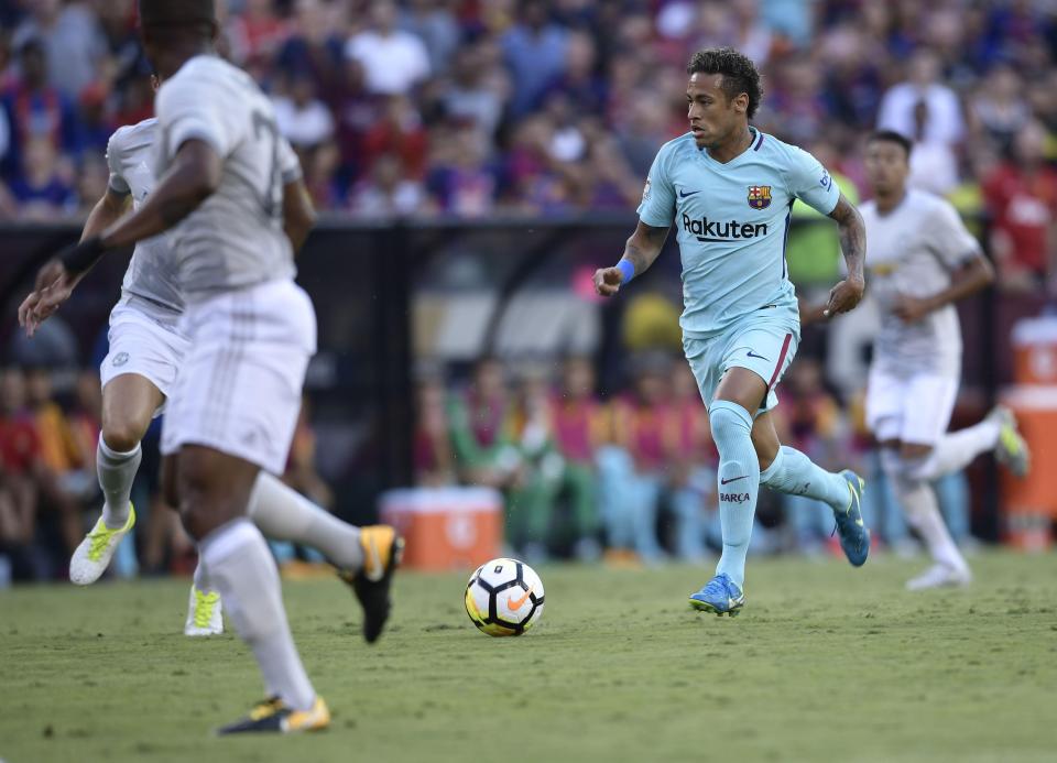  Neymar in action for Barcelona with his future still yet to be decided