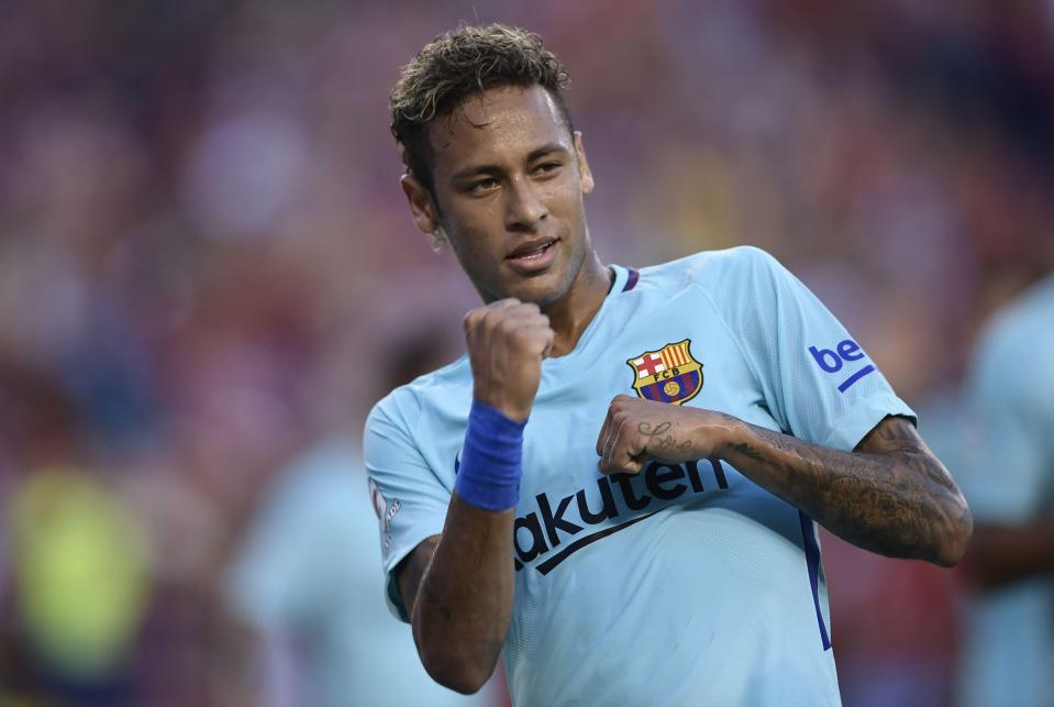  Neymar celebrates after his first-half goal at FedEx Field