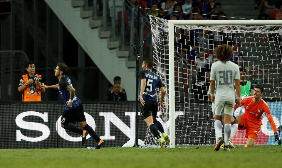 Inter Milan scored either side of half-time to sink Chelsea in Singapore