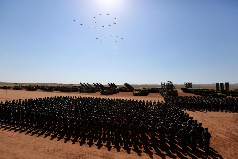  Tens of thousands of Chinese troops marched alongside tanks and nuclear weapons as stealth fighters and attack helicopters roared overhead