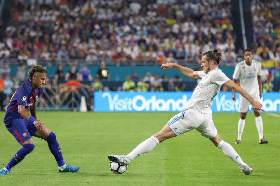  Gareth Bale in action against Barcelona during their Miami El Clasico