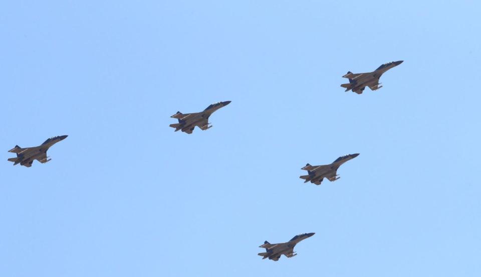  Several nuke-ready H-6K bombers were shown flying overhead. Here, Chinese fighter jets put on a show