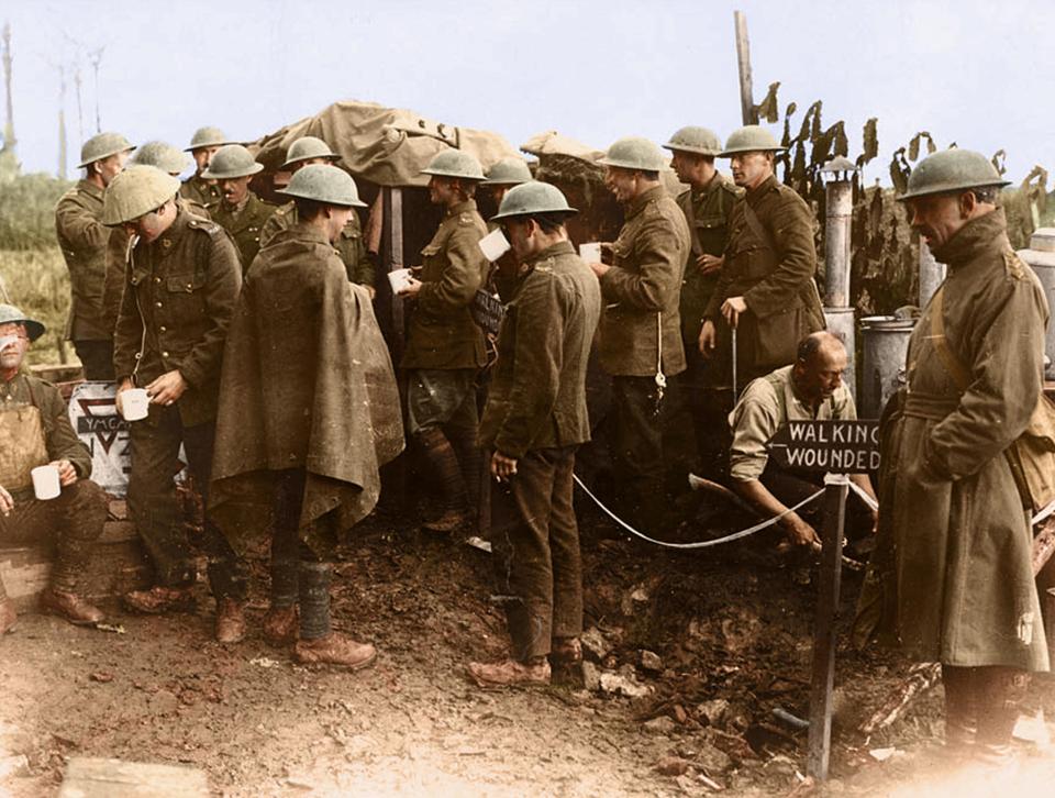  Soldiers queue up for tea rations at a position during a lull in the intensive fighting