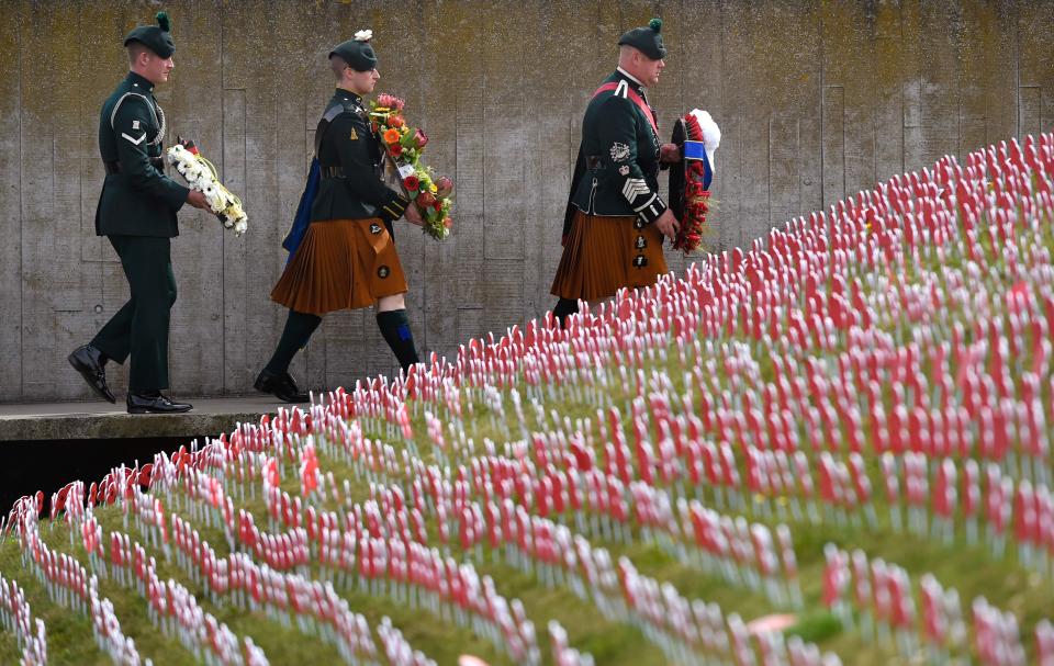  Members of the Irish brigade carry wreaths to place at the Tyne Cot cemetery