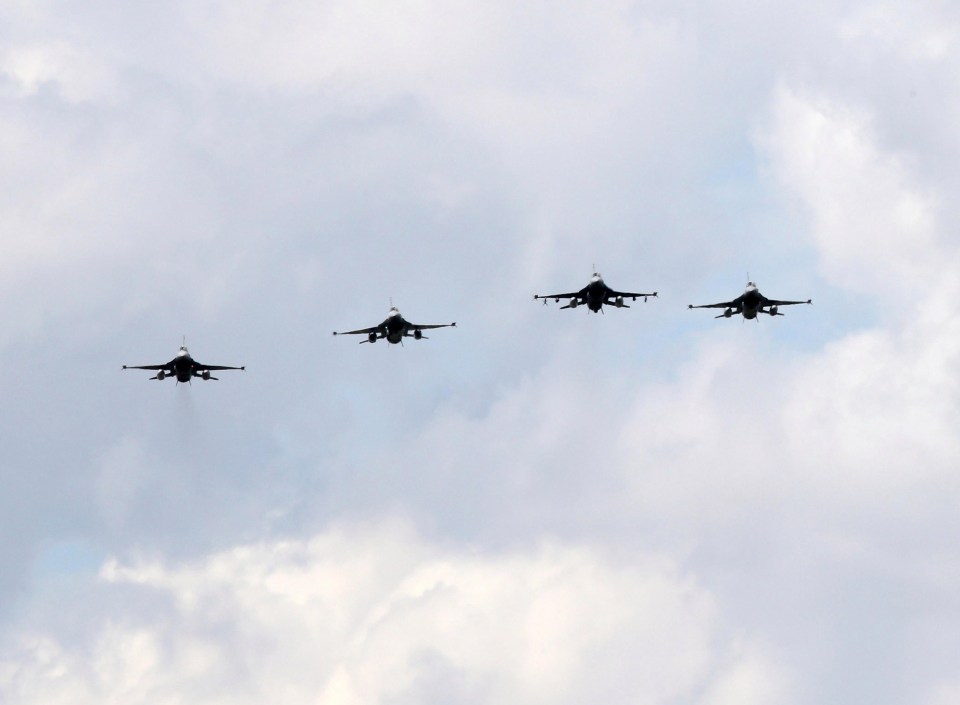 Fly past by the Belgian Air Force, who flew in a formation known as “The Salute to the Missing Man” during the ceremony