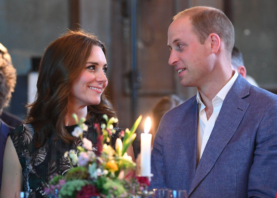 The couple share a 'loving' glance at a Berlin dancehall