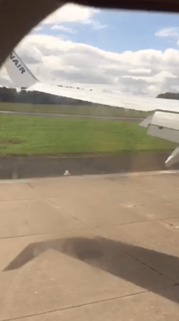  The plane's wing appears to tilt as it approaches the runway