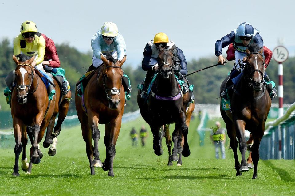  The Black Princess (right) wins the Lancashire Oaks for John Gosden and Robert Tart