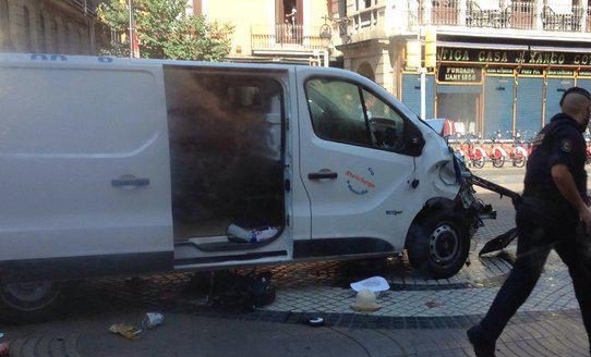  The white van suspected of ploughing into pedestrians in Barcelona yesterday