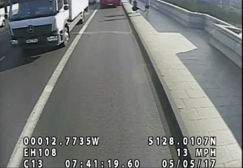 The woman is seen hurling towards the bus, which somehow manages to swerve into another lane to avoid striking her and causing serious injury