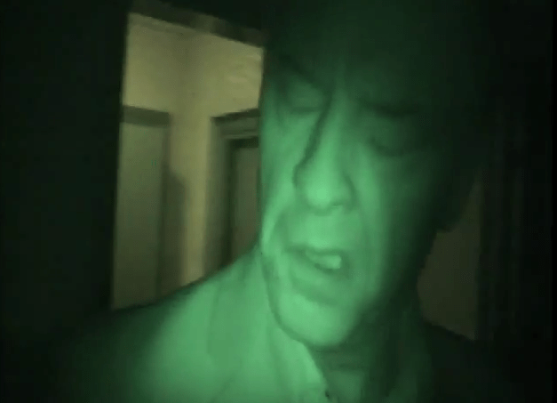 Derek's face contorts as a ghost takes over his body on Most Haunted 