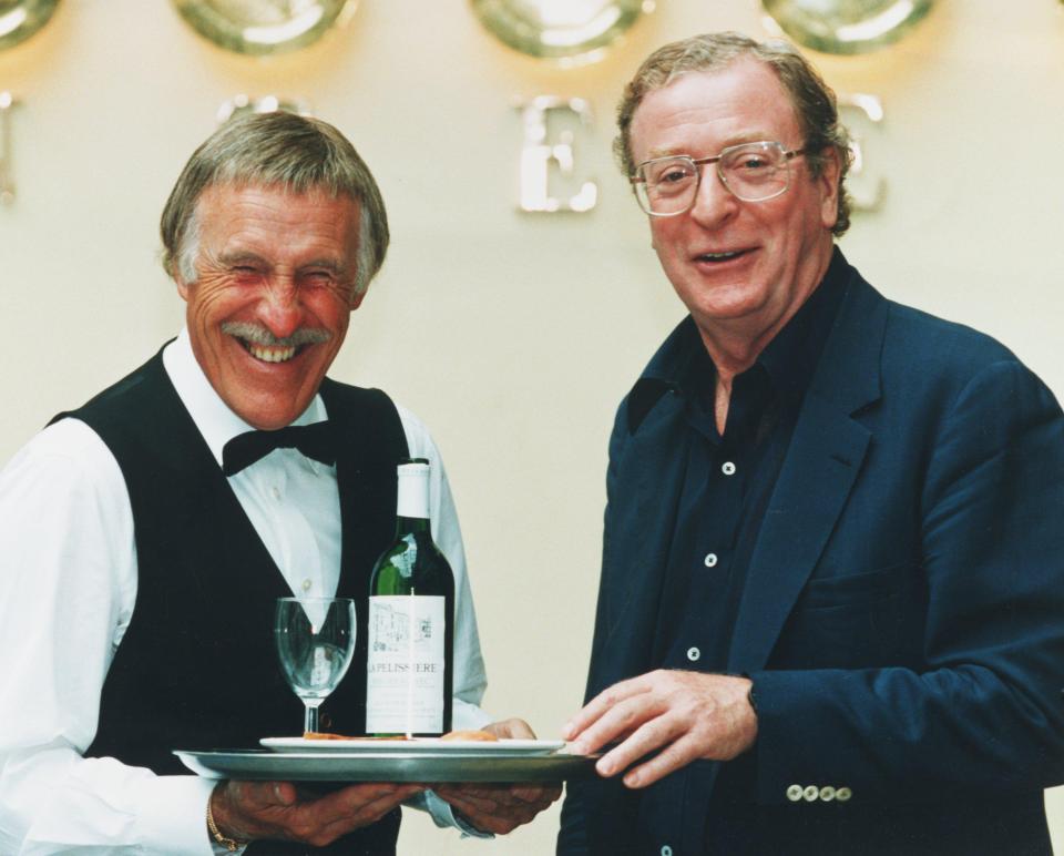  And serving up some fine wine to Sir Michael Caine