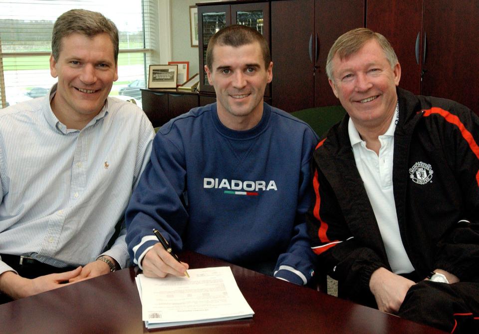  Keane signing a four-year contract with David Gill and Fergie in 2002