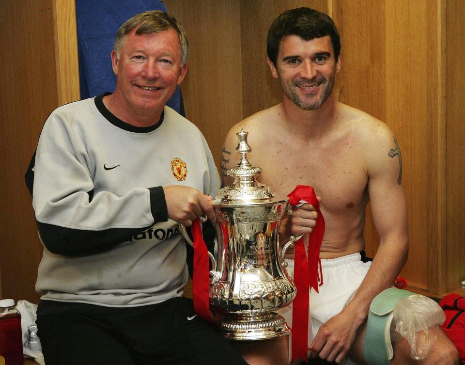  Fergie and Keane together in happier times with one of the four FA Cups they won together