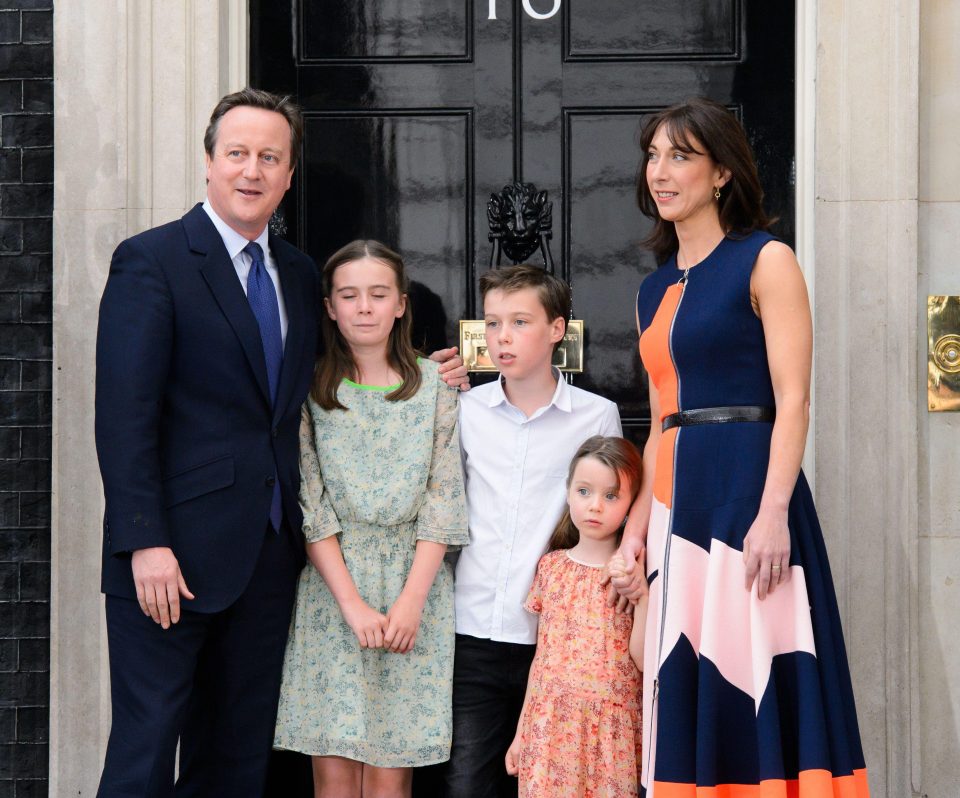  Sam, pictured with David and their three children, said the navy-and-orange dress she wore when the family quit Downing Street was actually her 'winning' outfit