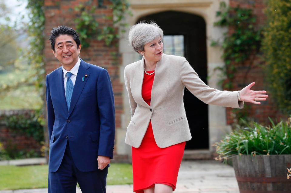  Theresa May's trip is set to be overshadowed by the North Korean missile test (the pair pictured at Chequers earlier this year)