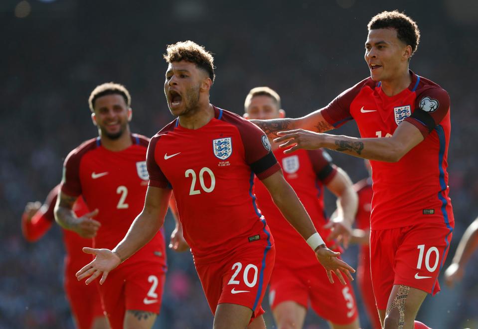  Alex Oxlade-Chamberlain celebrates scoring for England against Scotland