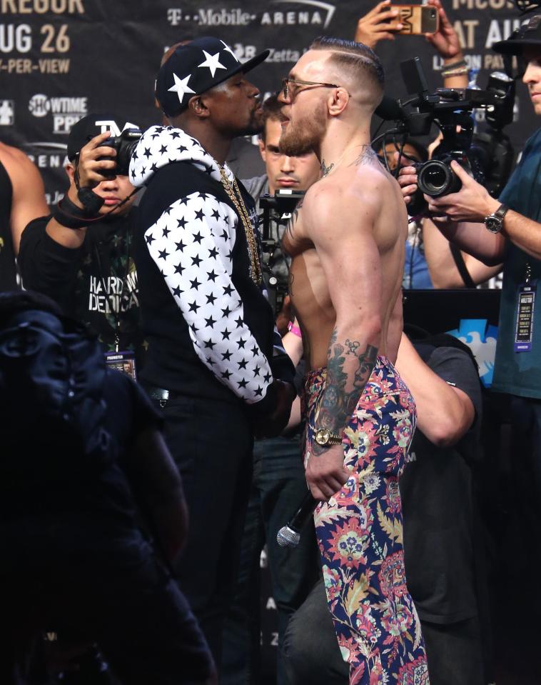  Conor McGregor takes on undefeated boxing ace Floyd Mayweather