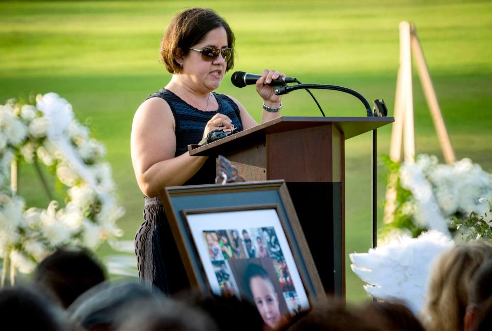  Ana Estevez speaks during a memorial for her son