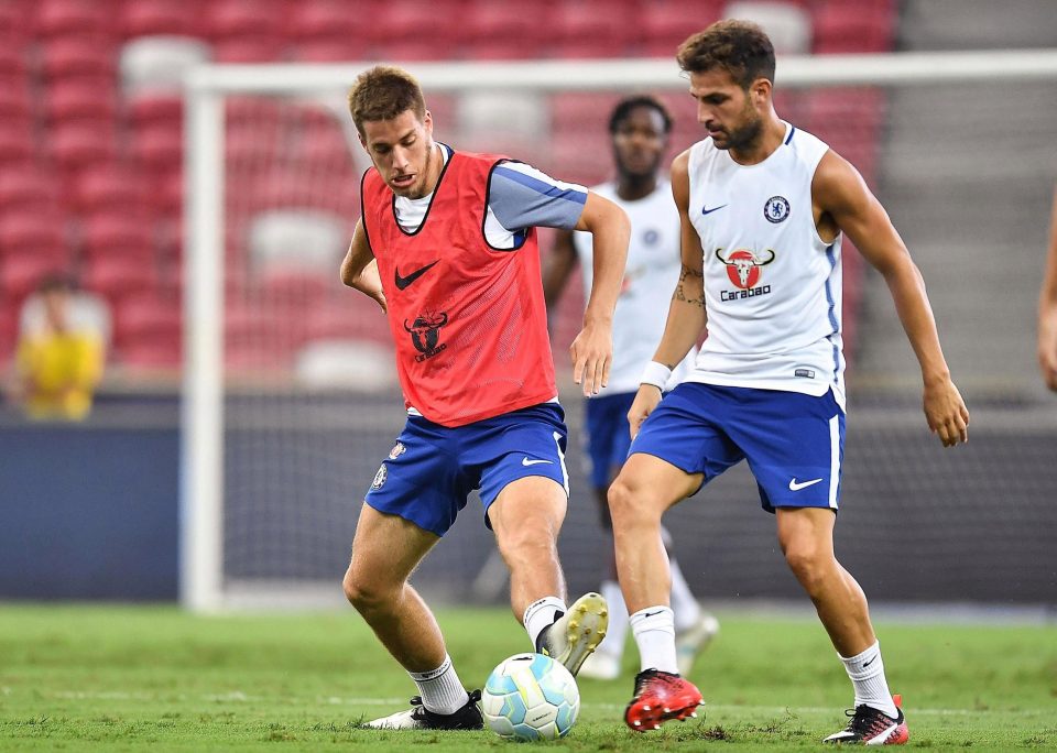  The Croatia international (left) was involved in Chelsea's pre-season tour of Asia