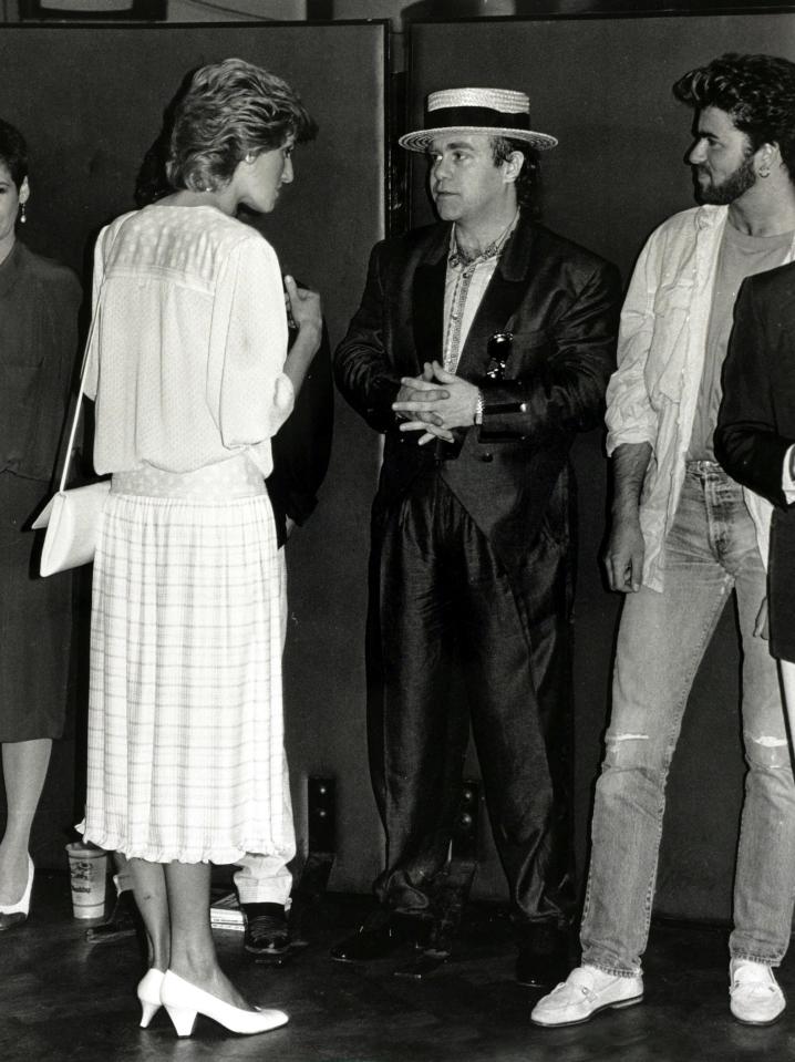  Princess Diana chatting to pals Elton John and George Michael at the 'Feed the World' Live Aid concert