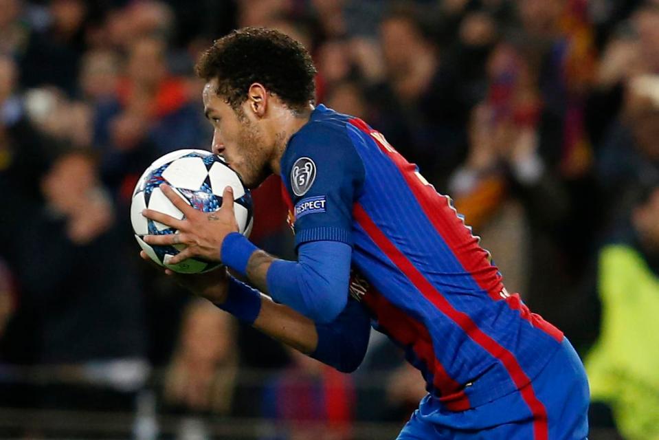  Neymar celebrates scoring against Paris Saint-Germain in 6-1 victory