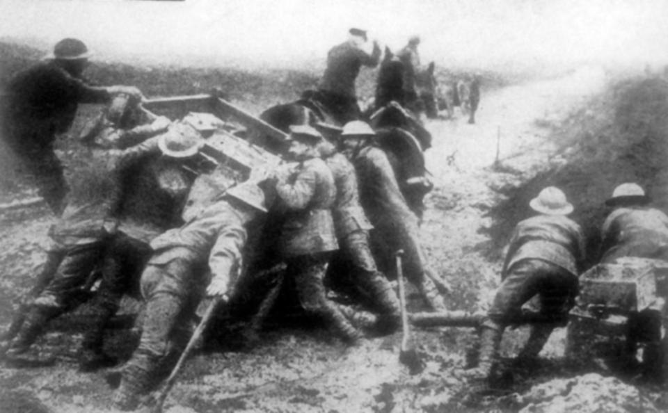  Troops try to shift a cart bogged down in terrible conditions