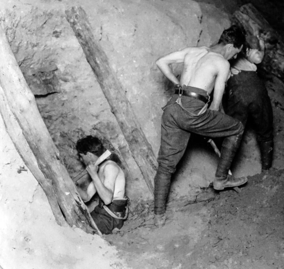  Exhausted miners dig trenches and tunnels at Messines on the Western Front