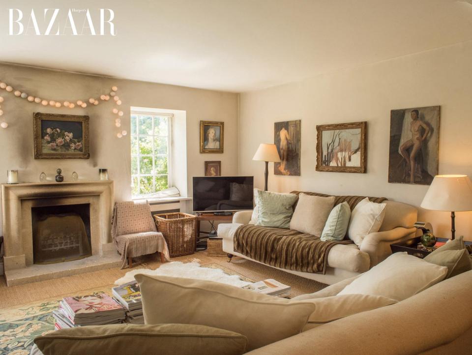  Samantha Cameron invited Harper's Bazaar into her family's idyllic Cotswold cottage. The living room is decorated in neutral tones, and features scatter cushions and a large sheepskin rug