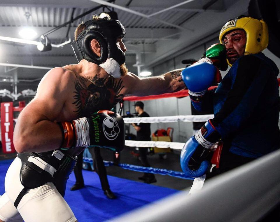  Conor McGregor throws a punch during sparring for his fight against Floyd Mayweather