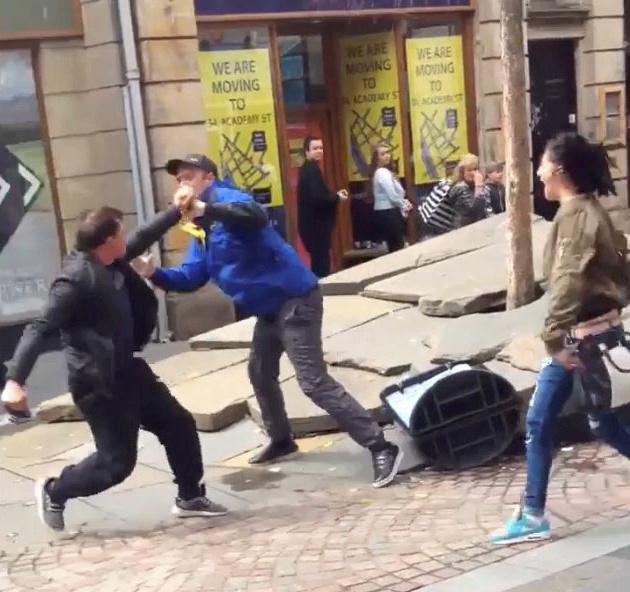  The fight unfolded outside the bookies, leaving onlookers horrified