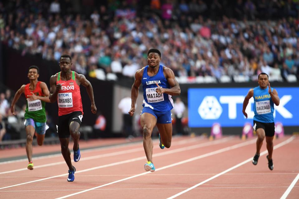  Emmanue Matadi of Liberia won the first 100m heat after the athletes were finally able to get started