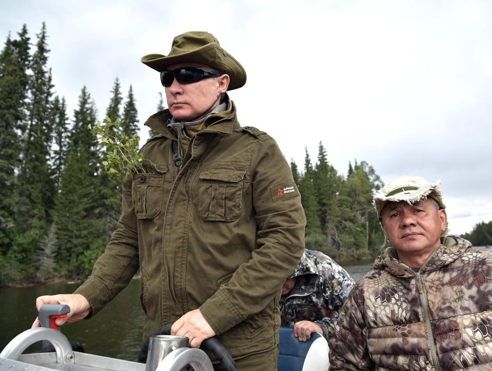  The helmsman ...Putin steers the fishing boat