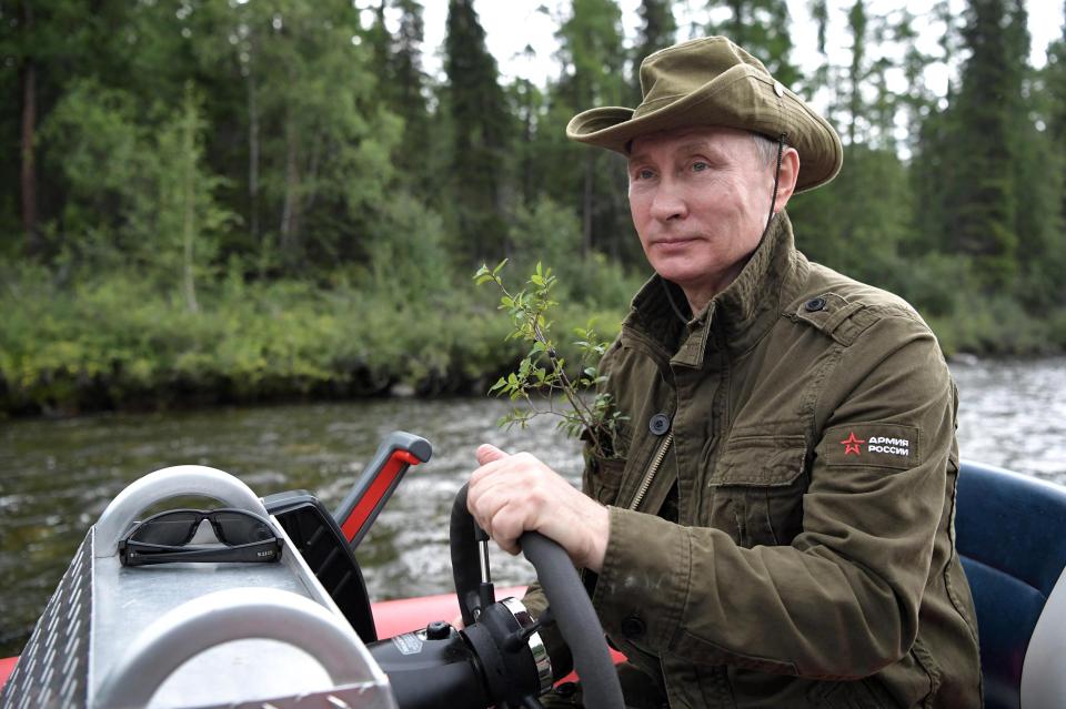  Wheel of power...boat ride in Khaki and hat