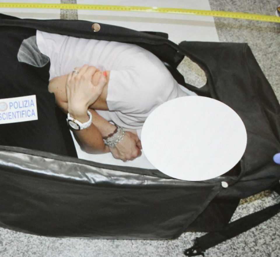  The woman was stuffed inside a suitcase and transported to a house in Turin after being drugged in Milan. Pictured is a police reconstruction photo